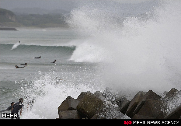 توفان در چین و ژاپن (عکس)